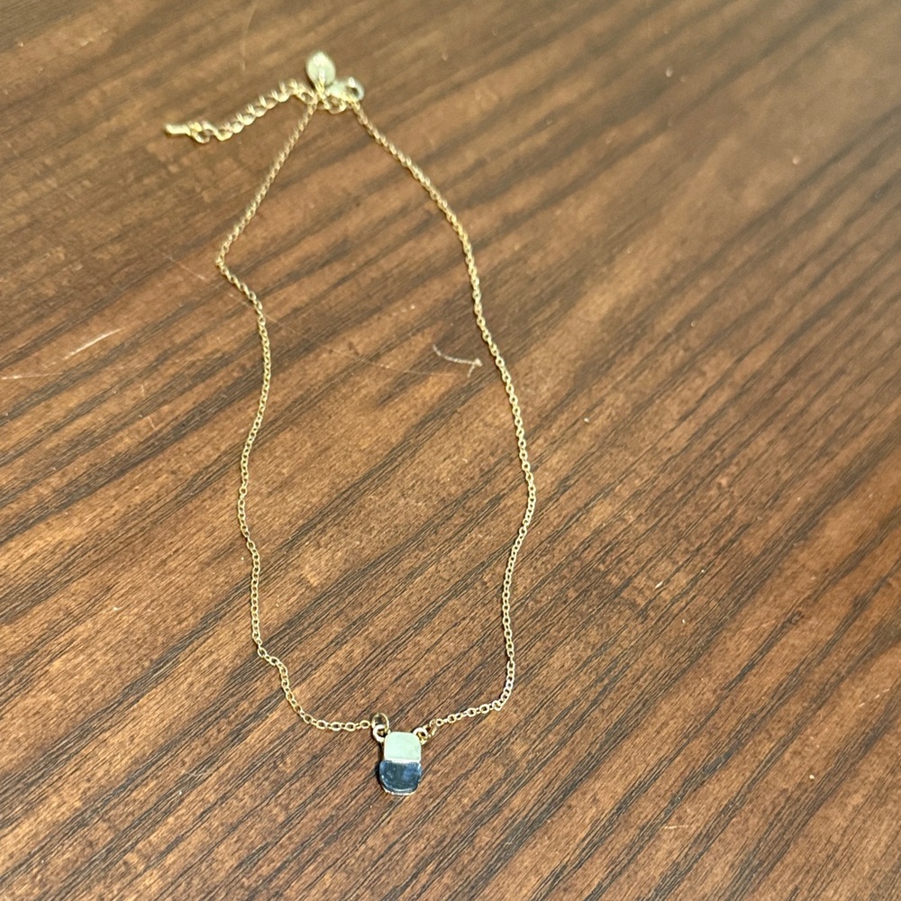 Elegant Gold Necklace with Blue Pendant